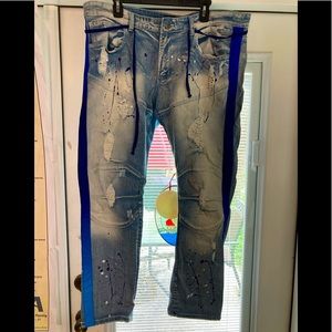 Jeans splattered & distressed by manufacturer